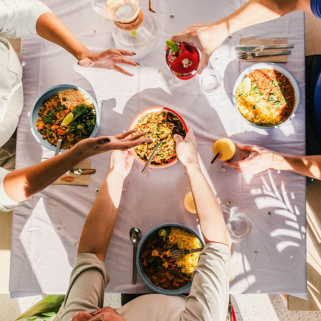 A group of creative professionals connecting over a relaxed lunch